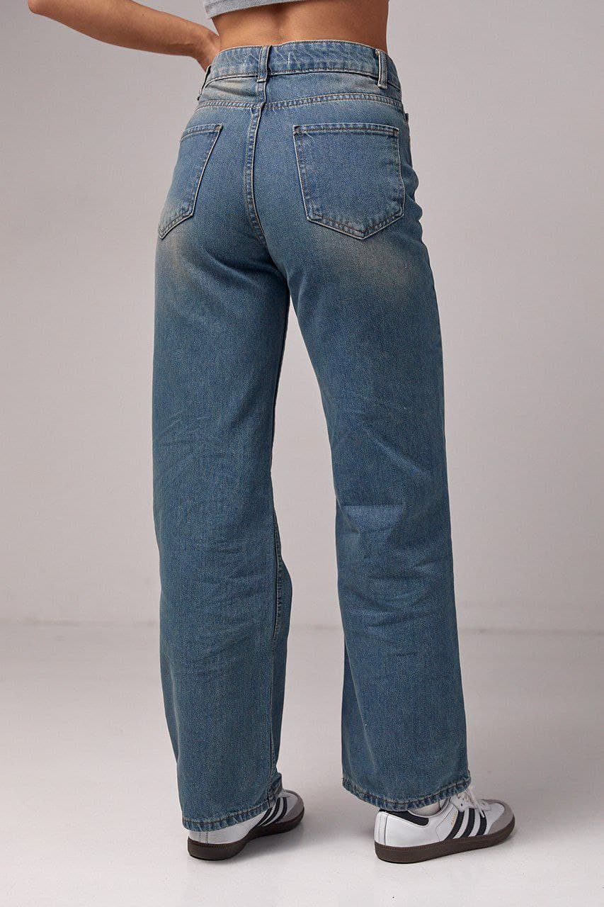 Жіночі джинси з ефектом потертості — 1