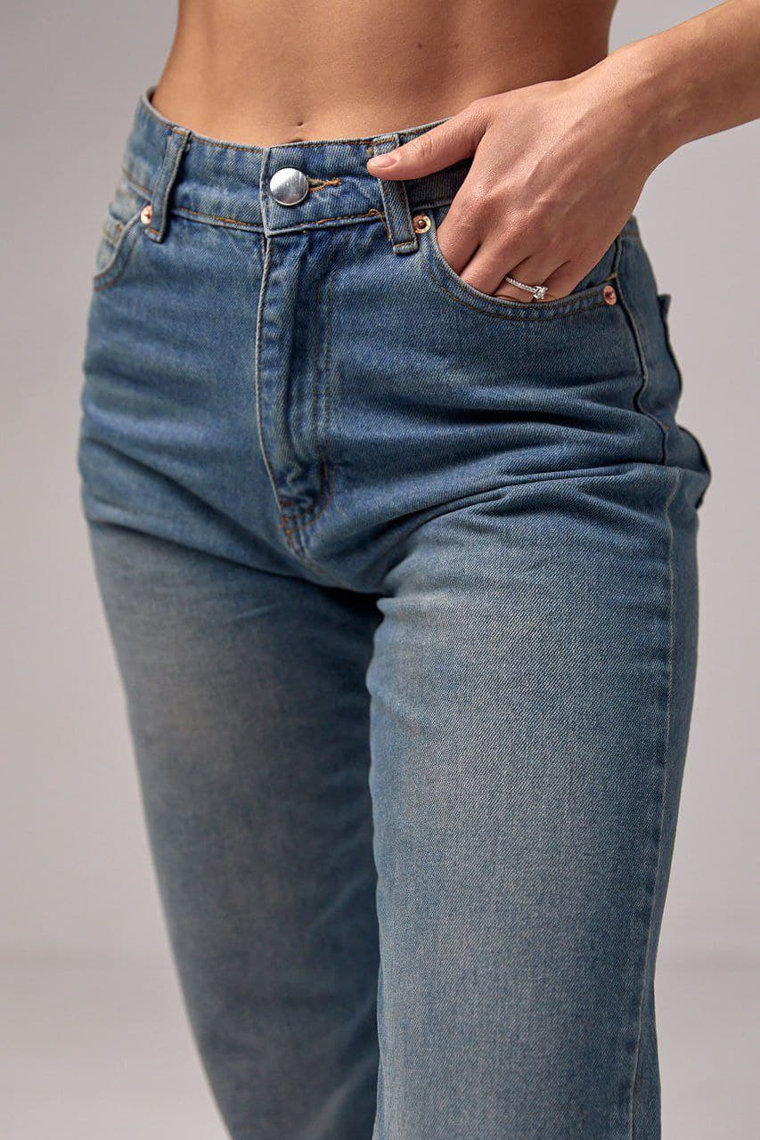 Жіночі джинси з ефектом потертості — 4